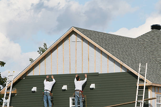 Professional Siding technician working in Dupont, CO